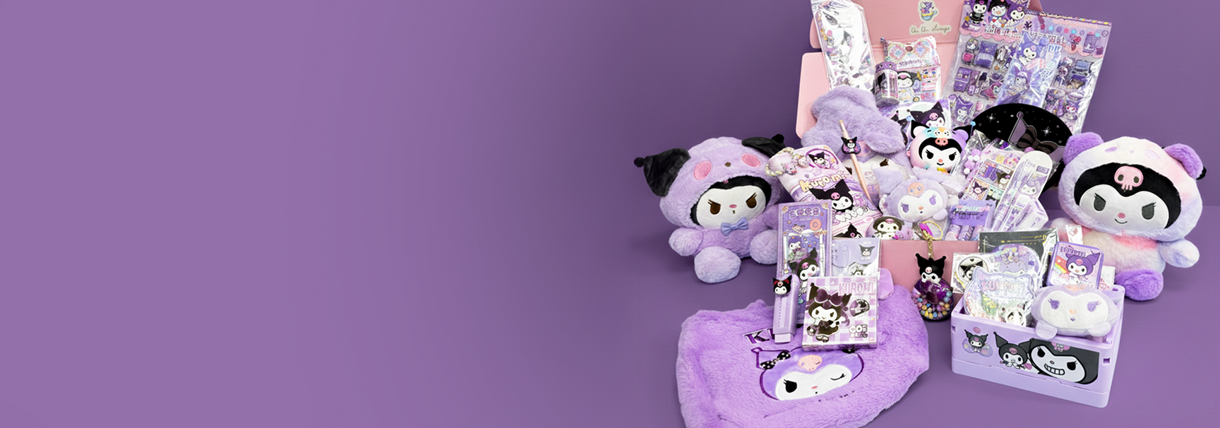 Random character kids gift box featuring kawaii stationery, charms, collectibles and adorable birthday gift surprises from a Lucky Scoop mystery box.